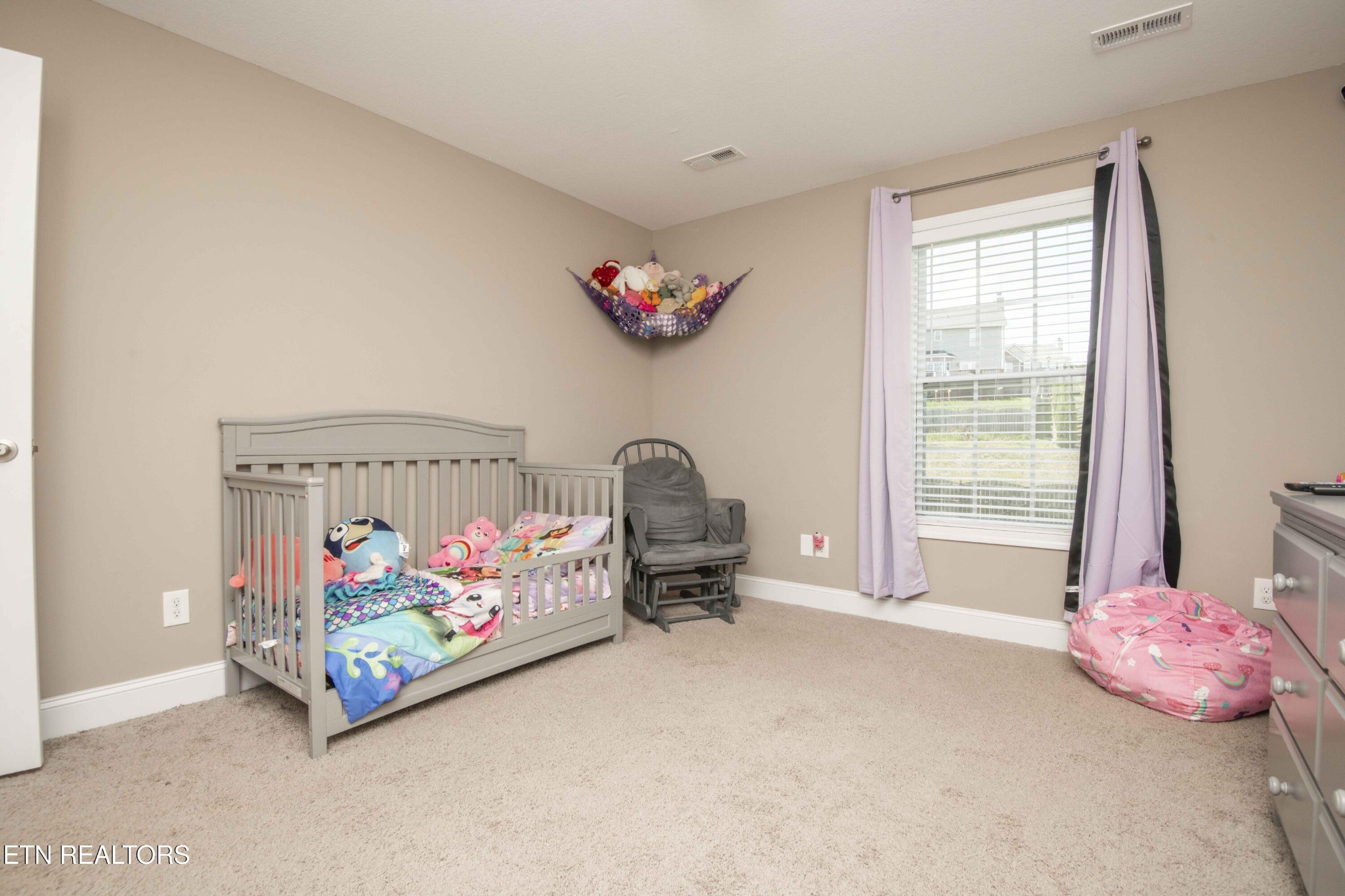 3035 Crosswinds Lane Sevierville, TN 37876 - Photo 34 of 51 a bed room with furniture and a window