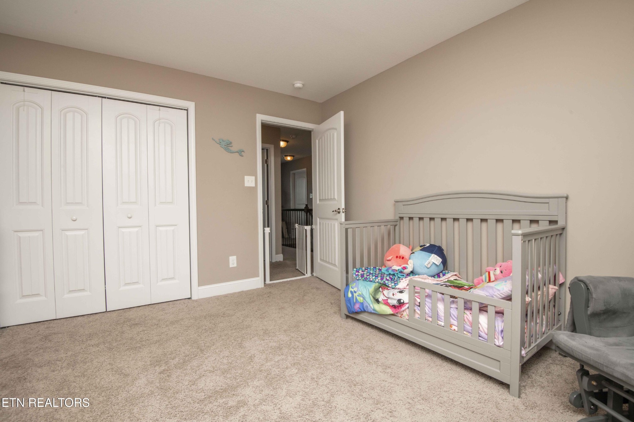 3035 Crosswinds Lane Sevierville, TN 37876 - Photo 36 of 51 a bedroom with bed and a couch