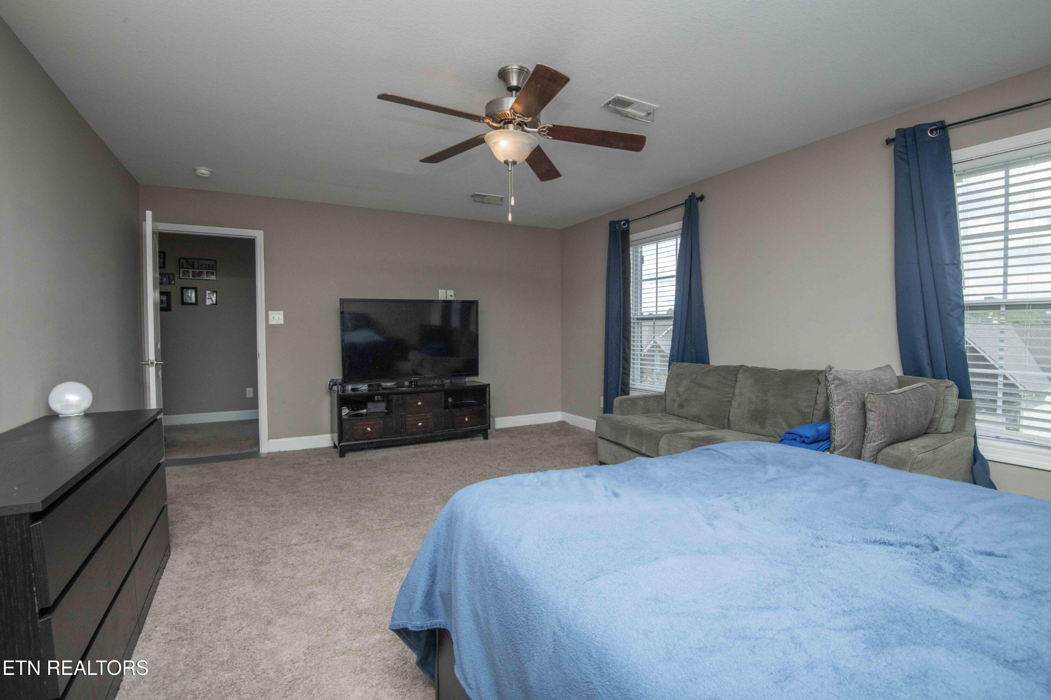 3035 Crosswinds Lane Sevierville, TN 37876 - Photo 37 of 51 a bedroom with a bed and a flat screen tv
