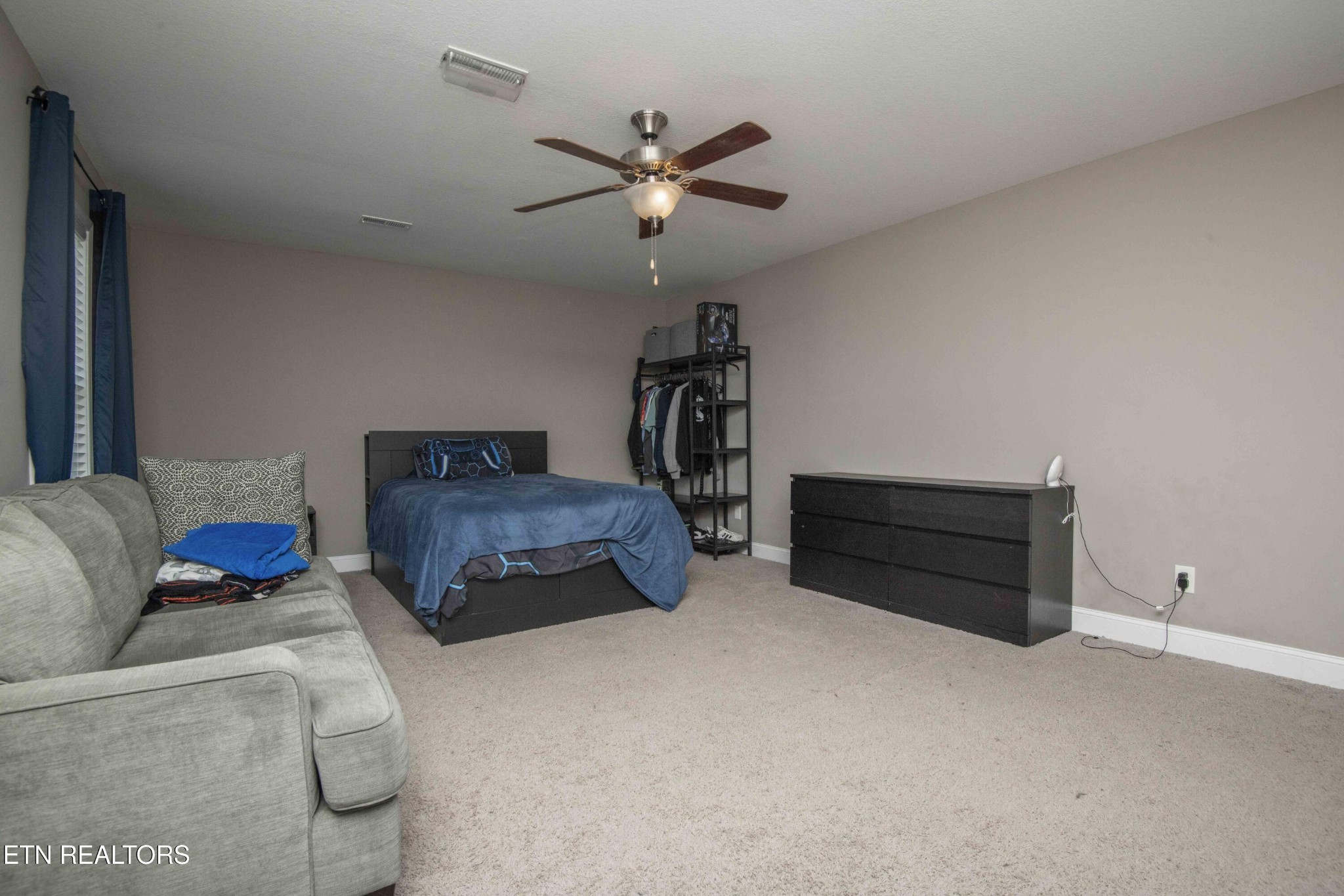 3035 Crosswinds Lane Sevierville, TN 37876 - Photo 38 of 51 a bedroom with furniture and a ceiling fan