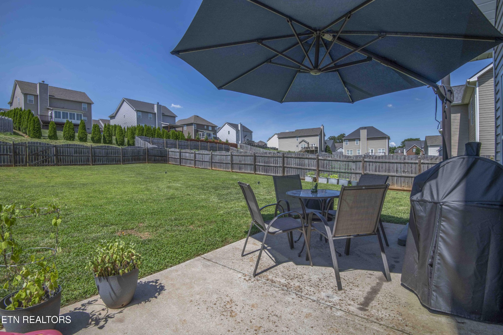 3035 Crosswinds Lane Sevierville, TN 37876 - Photo 50 of 51 a view of a chairs and table in the patio
