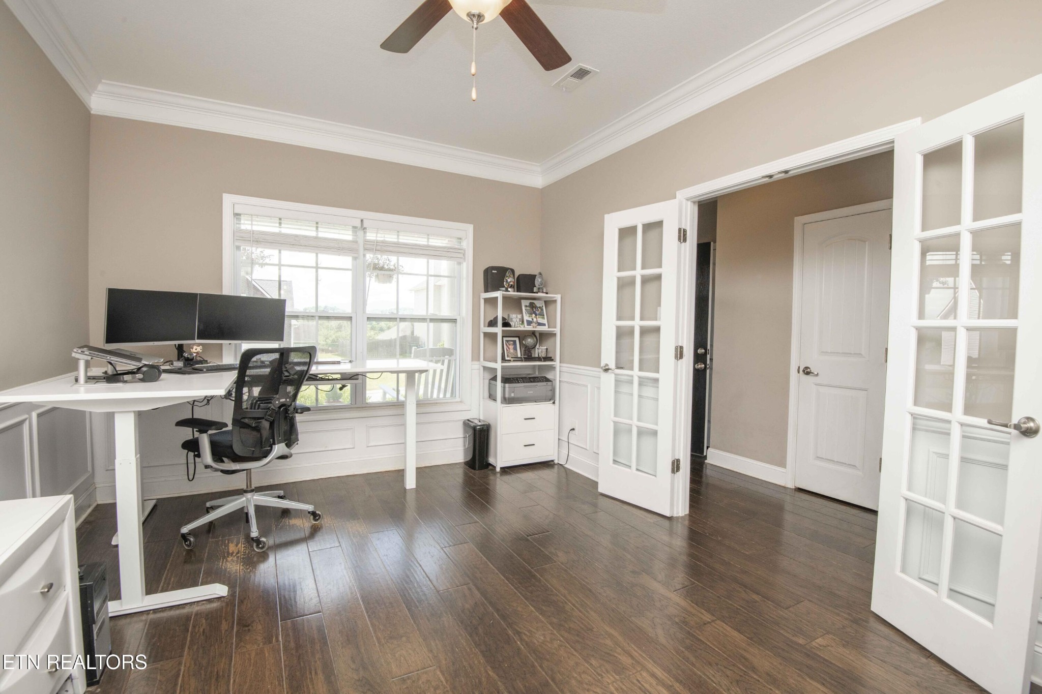 3035 Crosswinds Lane Sevierville, TN 37876 - Photo 6 of 51 a view of a workspace with wooden floor and white cabinet