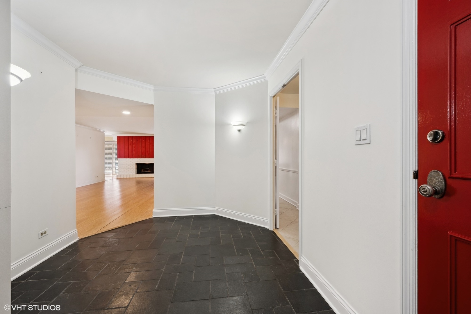 3851 Mission Hills Road, Unit 203 Northbrook, IL 60062 - Photo 3 of 21 a view of a hallway with wooden cabinets