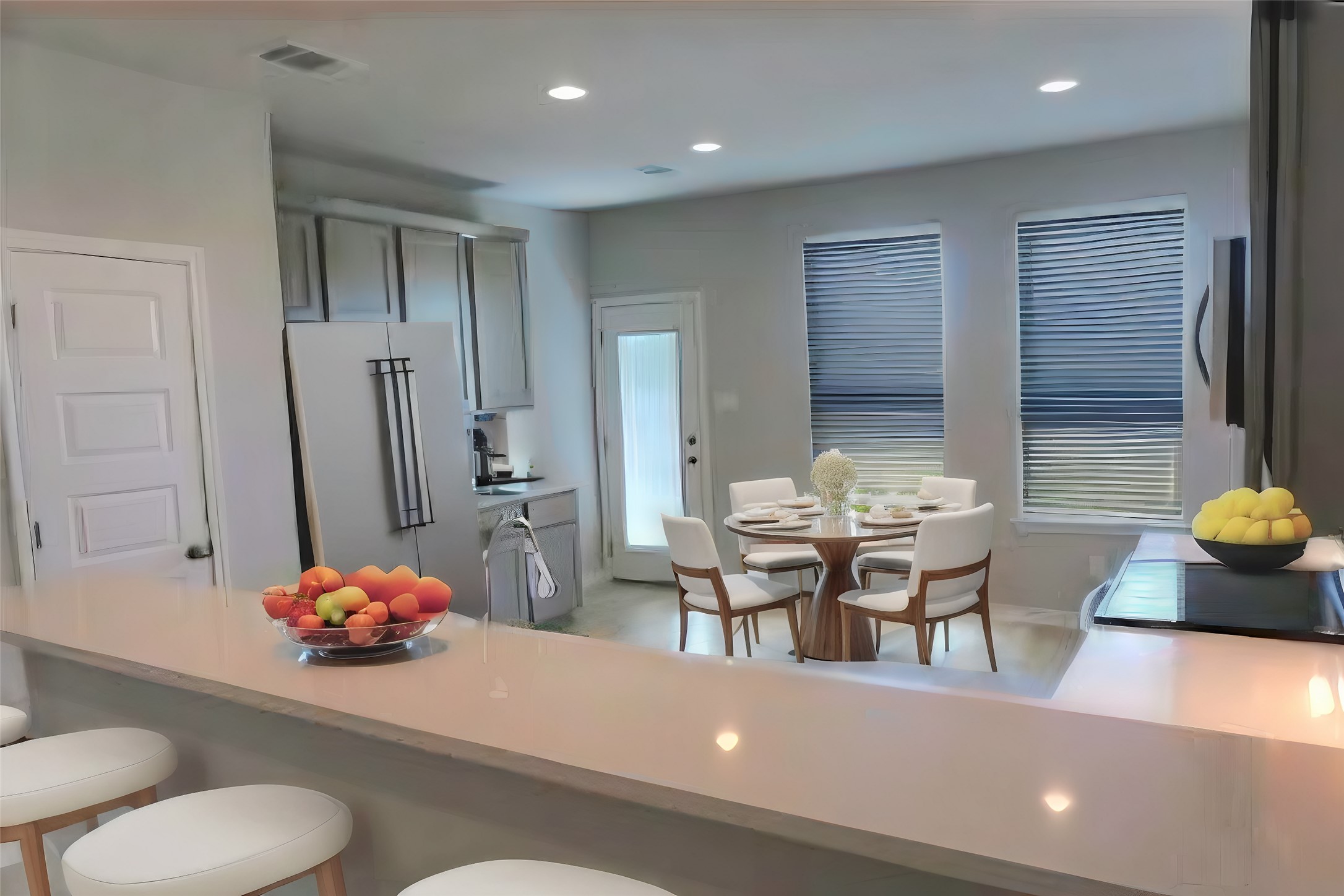 104 Batjac Alley Jarrell, TX 76537 - Photo 6 of 11 Open-concept kitchen and dining area featuring light wood-finish flooring, recessed lighting, and a kitchen island with a light-colored countertop