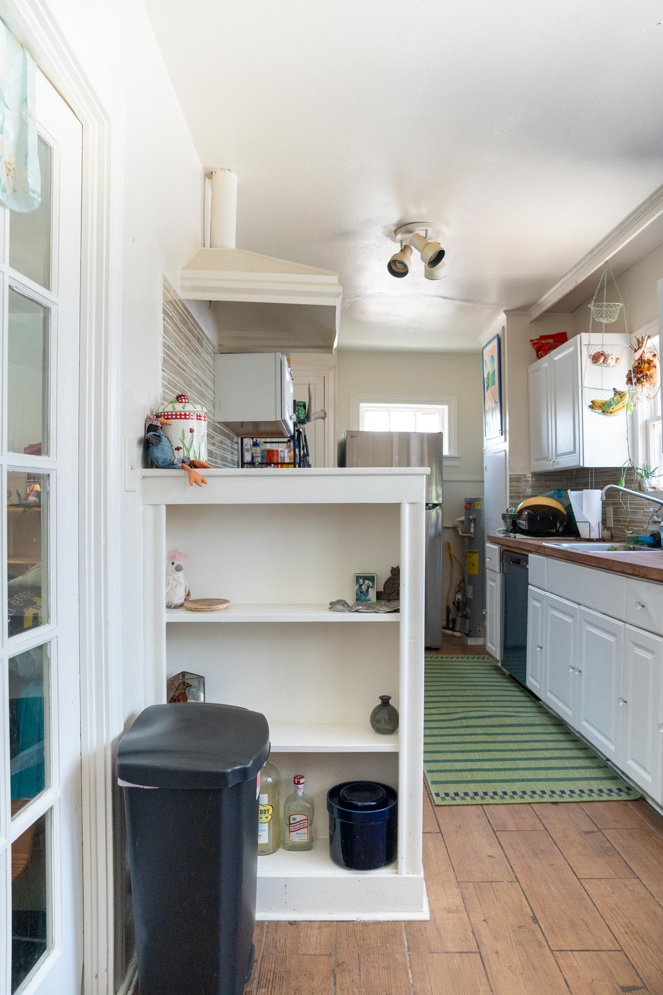 1909 Colquitt Street, Unit 7 Houston, TX 77098 - Photo 17 of 17 a kitchen with a cabinets and window