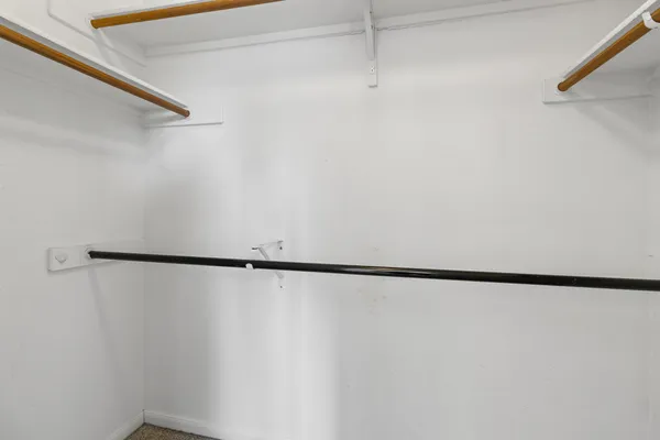 a bathroom with a sink a toilet and vanity