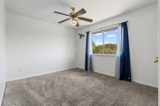 a bathroom with a sink a toilet and bathtub