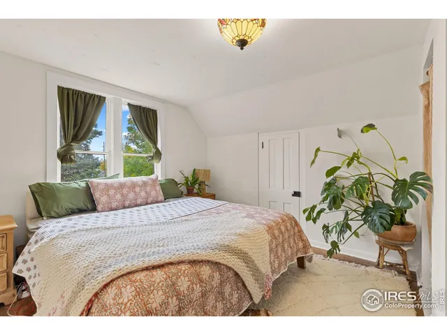 a bathroom with a sink toilet and a mirror