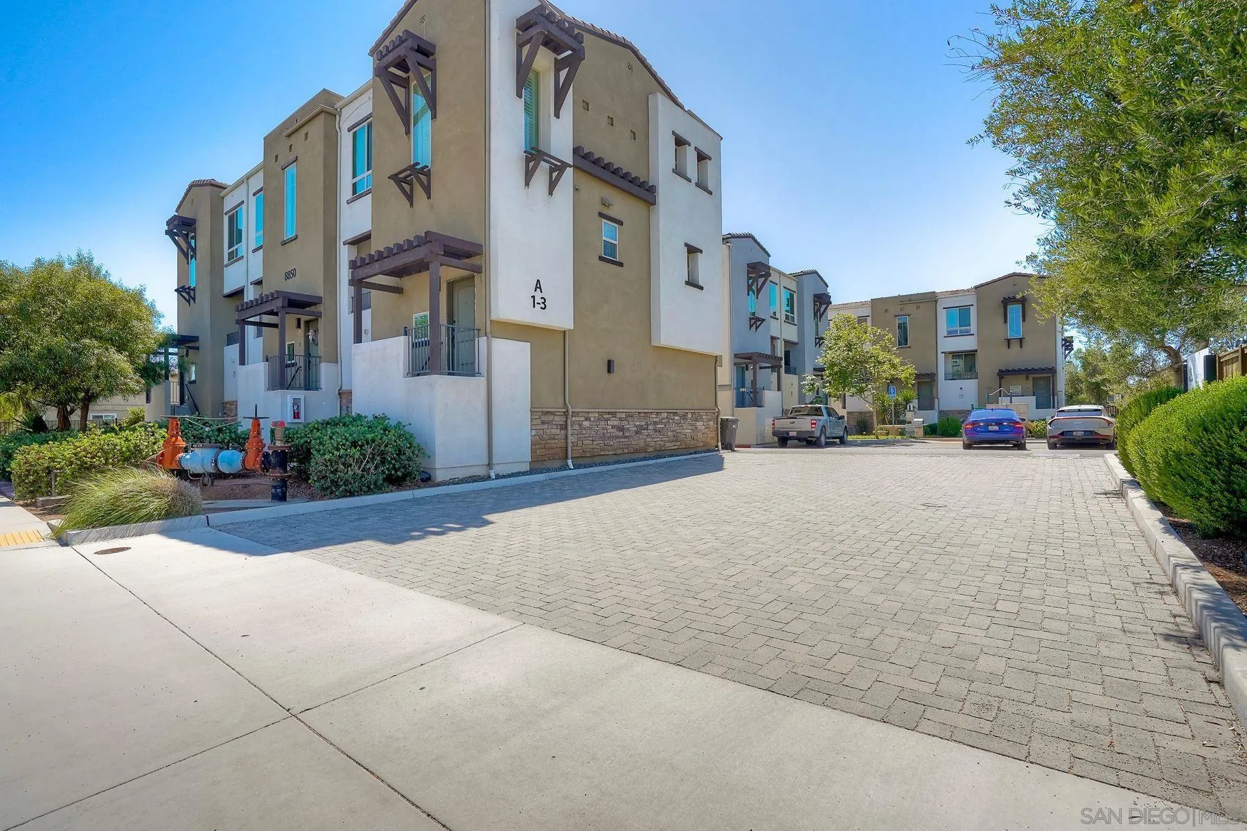 8850 Olive Lane, Unit 7 Santee, CA 92071 - Photo 27 of 27 a view of a street with a building in the background