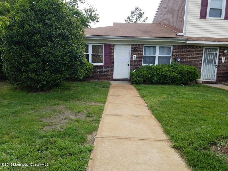 293 Sawmill Road Brick, NJ 08724 - Photo 1 of 5 a front view of a house with garden