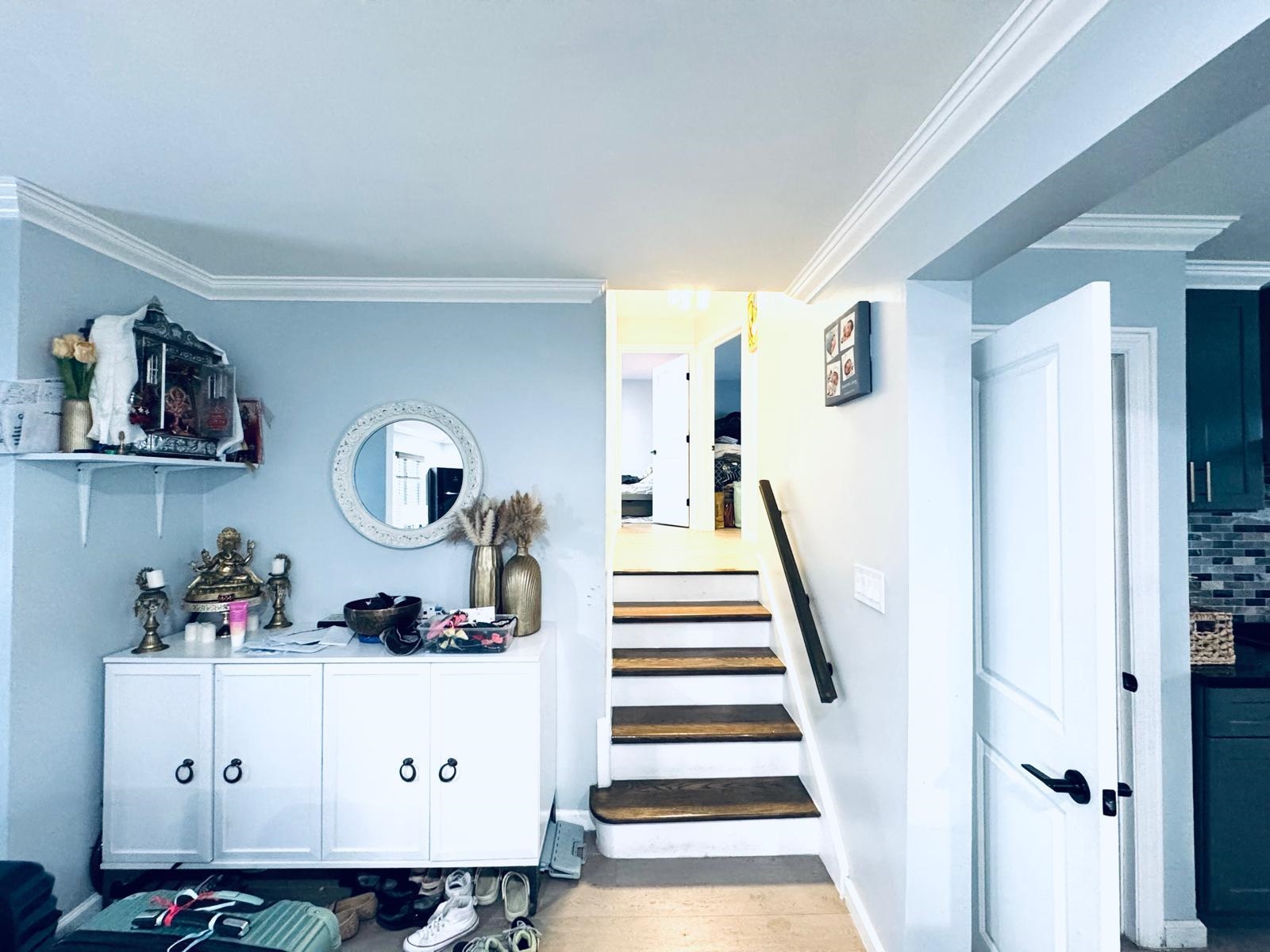 53 Harrison Street Dumont, NJ 07628 - Photo 21 of 28 a room with lots of white furniture and wooden floor