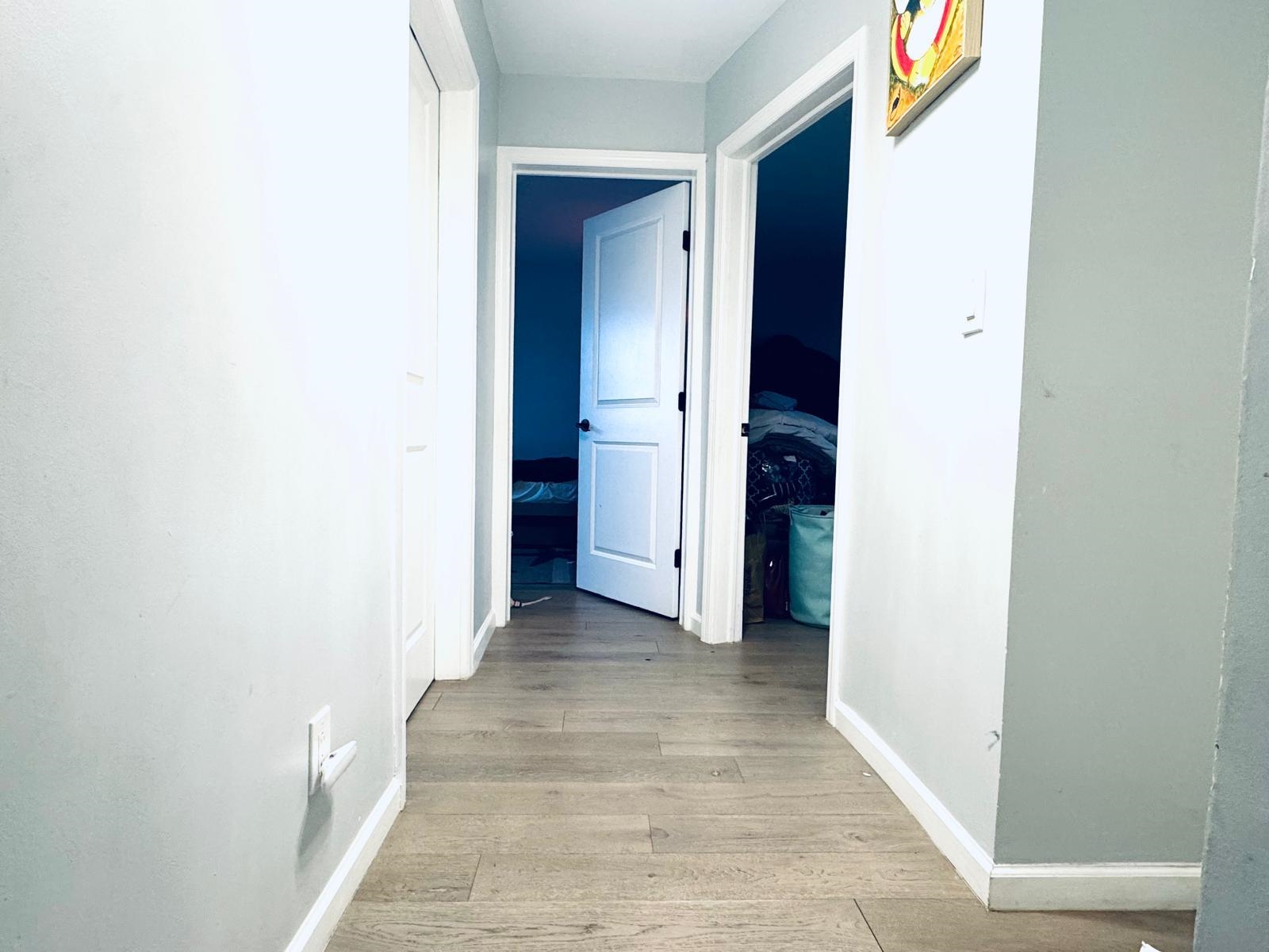 53 Harrison Street Dumont, NJ 07628 - Photo 5 of 28 a view of a hallway with wooden floor and entryway