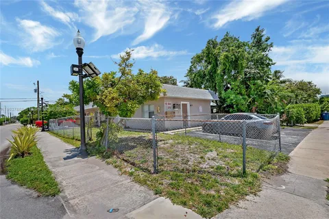 a house view with a seating space and garden view