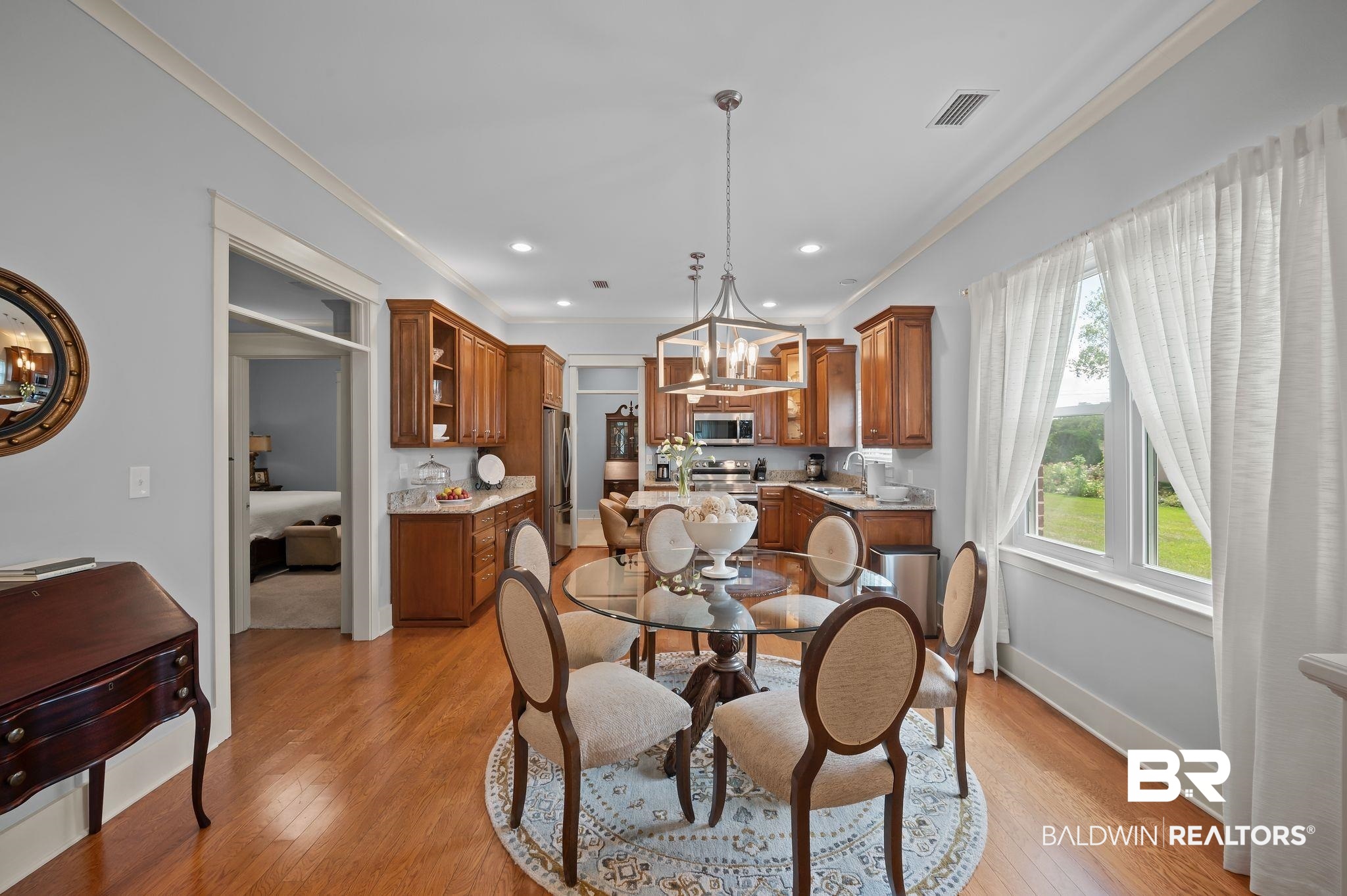 905 Buttercup Lane Foley, AL 36535 - Photo 20 of 47 Dining room with a chandelier, ornamental molding, light wood-style flooring, and recessed lighting