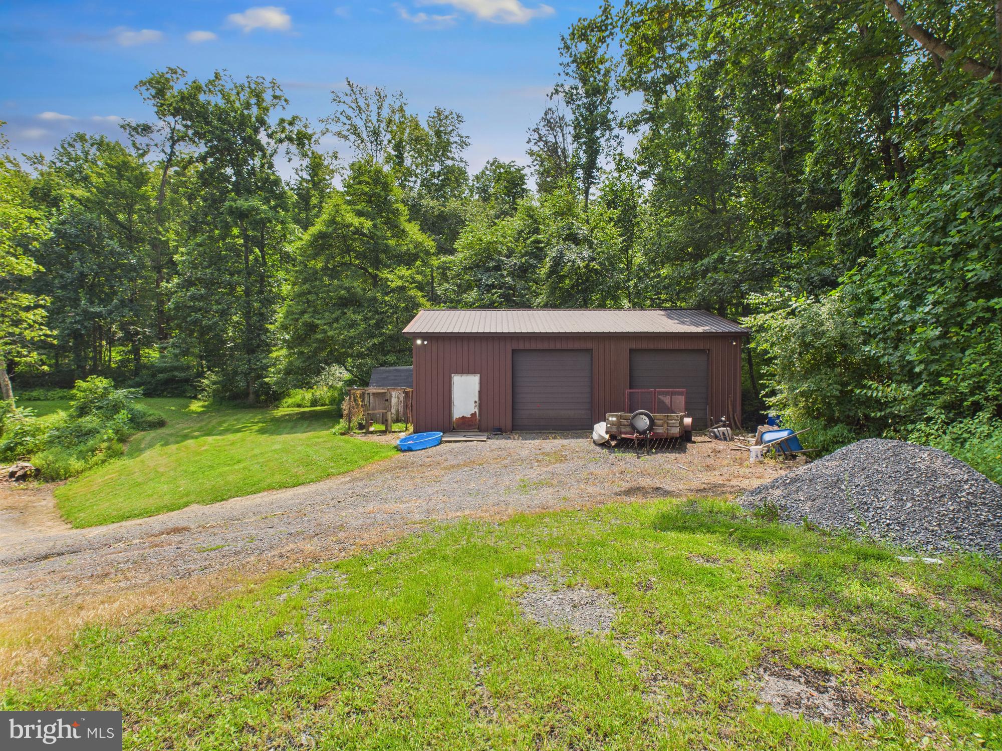 1640 Dunkleberger Road Elliottsburg, PA 17024 - Photo 14 of 39 a view of a house with backyard and garden