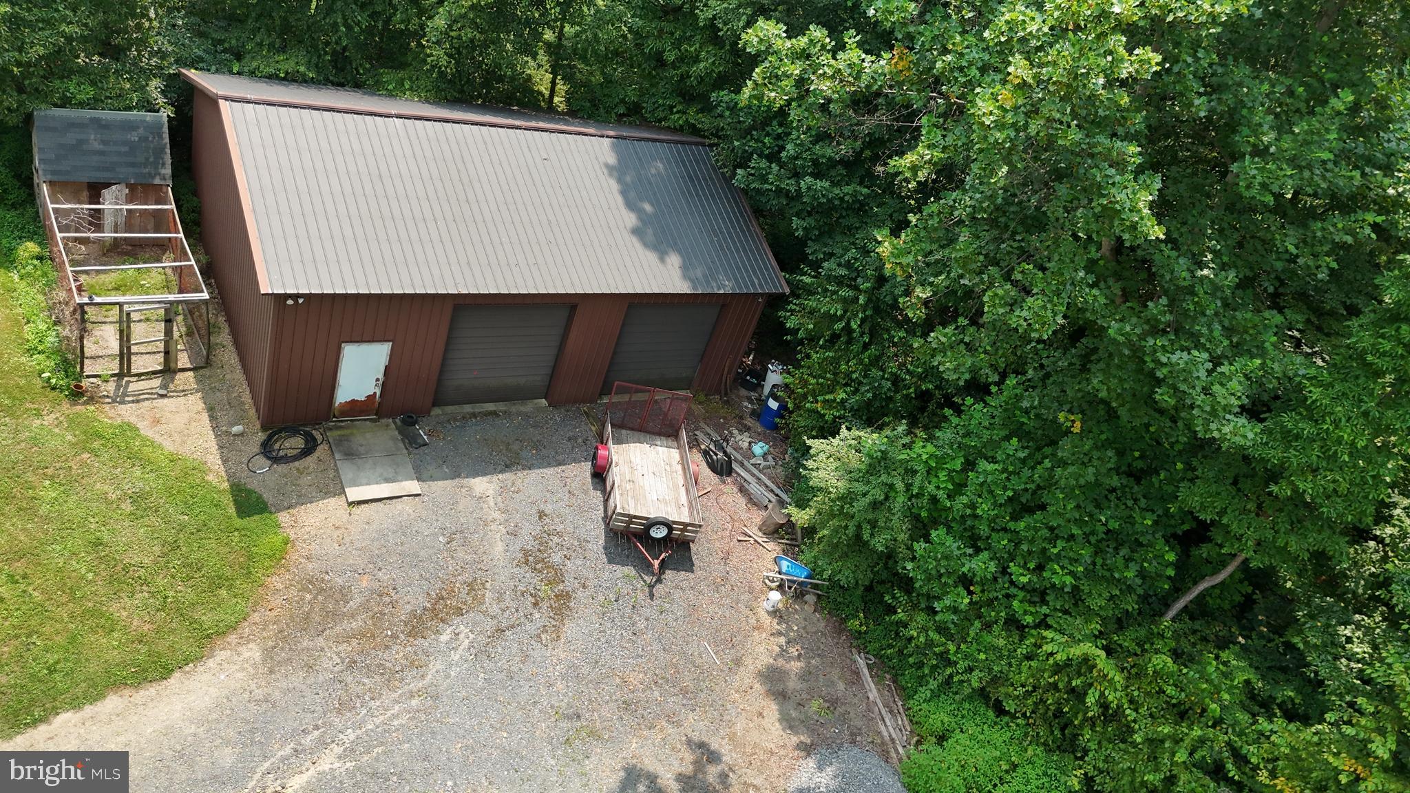 1640 Dunkleberger Road Elliottsburg, PA 17024 - Photo 15 of 39 an aerial view of a house with yard and seating area