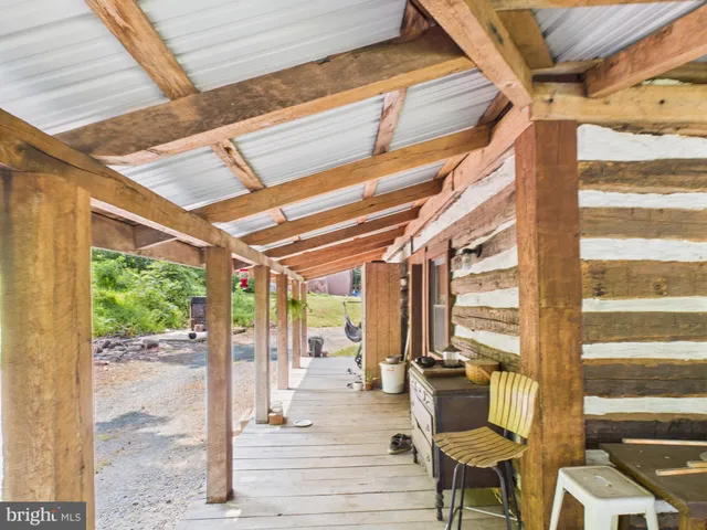 a view of balcony with wooden floor