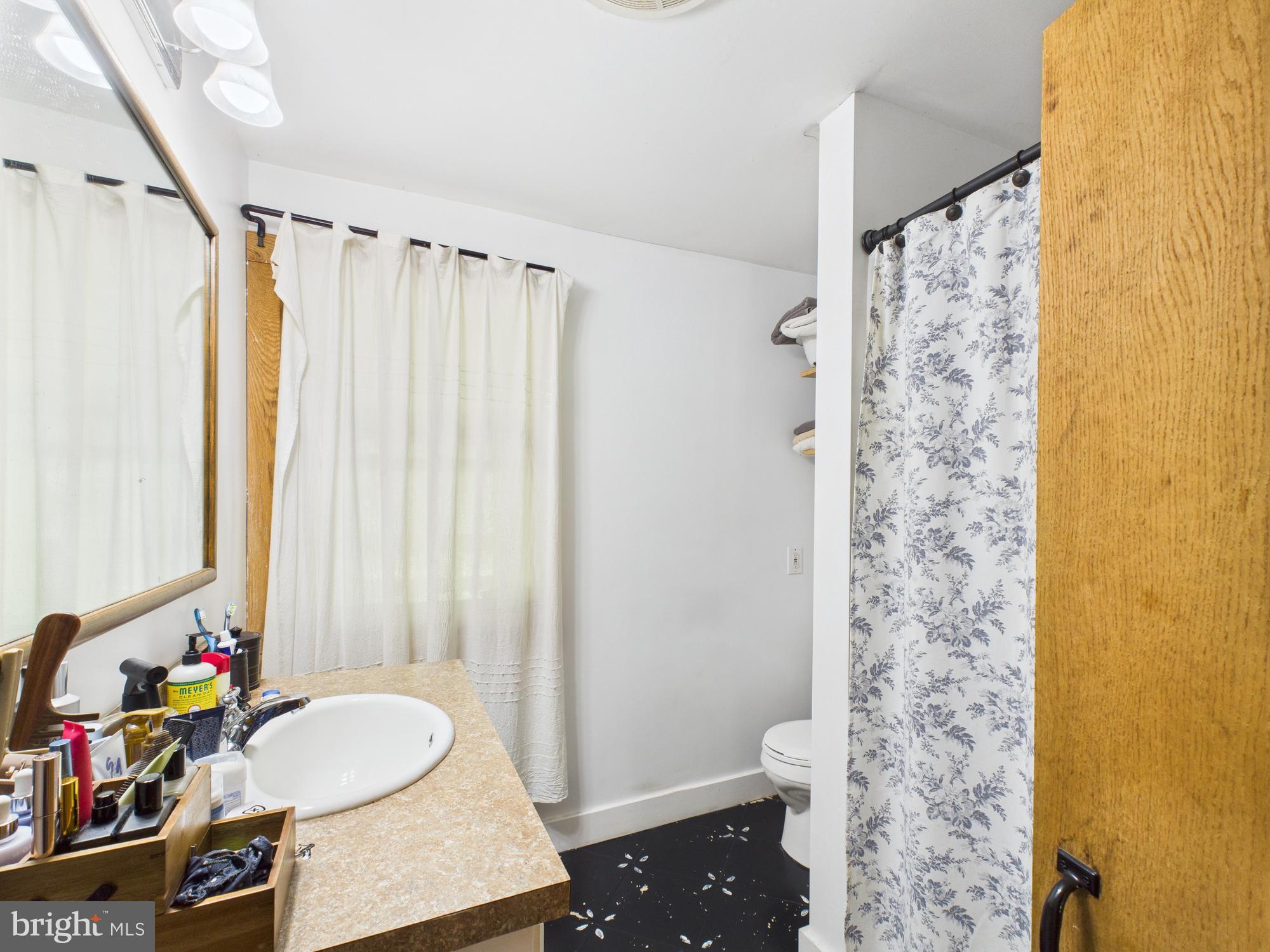 1640 Dunkleberger Road Elliottsburg, PA 17024 - Photo 31 of 39 a bathroom with a sink toilet and shower