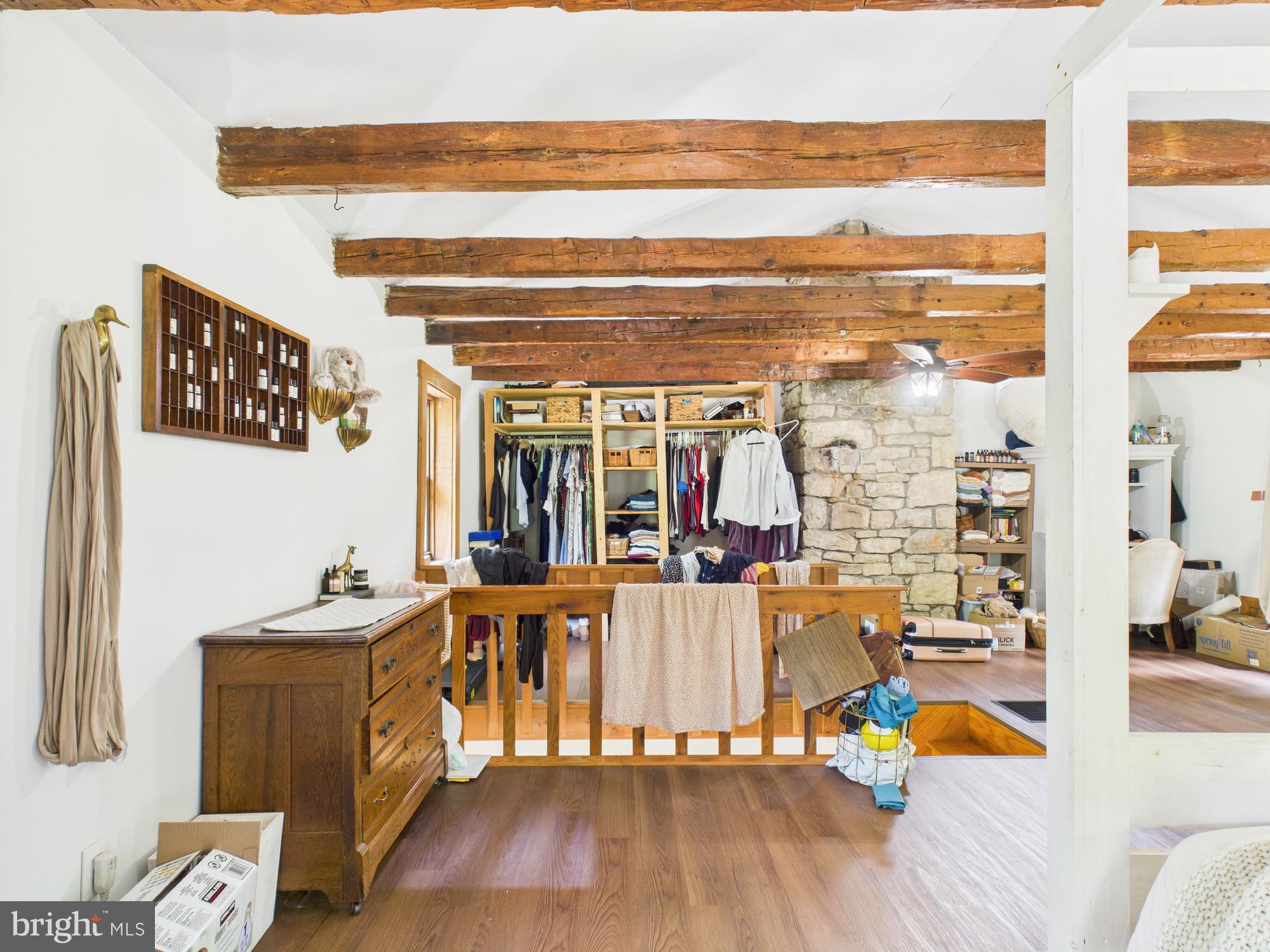 1640 Dunkleberger Road Elliottsburg, PA 17024 - Photo 35 of 39 a living room with furniture a wooden floor and next to a window