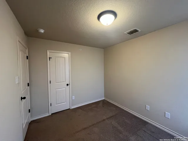 a bathroom with a white bath tub
