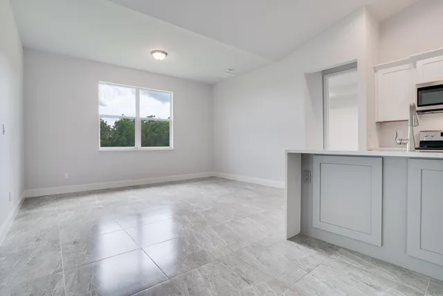 an empty room with windows