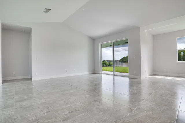 an empty room with window