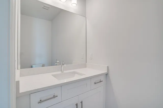 an empty room with sliding glass door