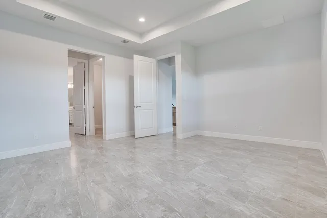 a bathroom with a double vanity sink mirror and double