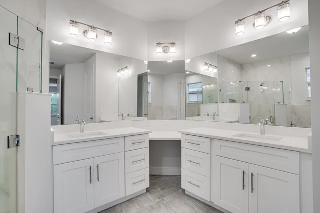 a view of a bathroom from a hallway with toilet