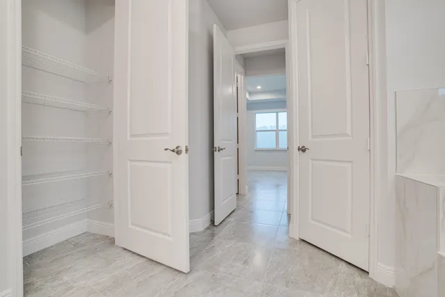 an aerial view of a house with a ocean view
