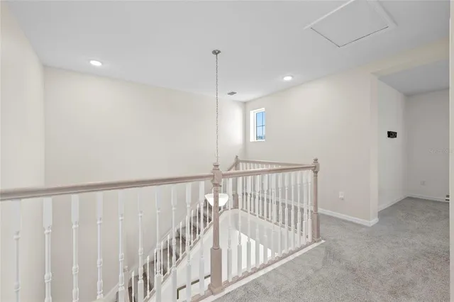 a view of hallway with stairs
