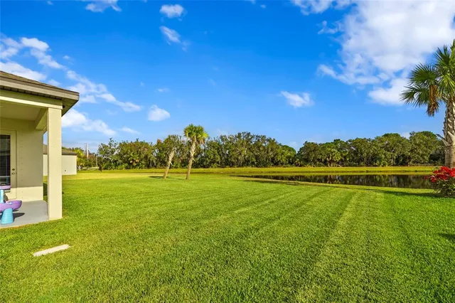 a view of an ocean house a swimming pool and outdoor space
