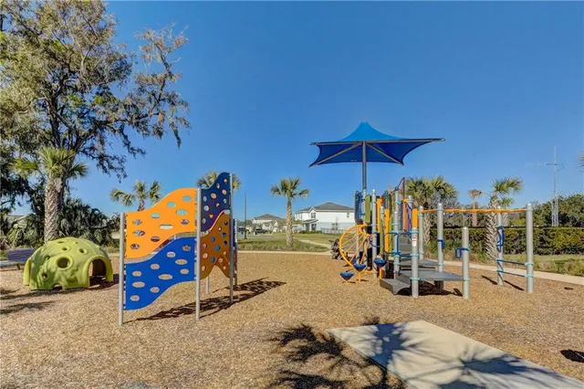 a view of outdoor space with deck and tree