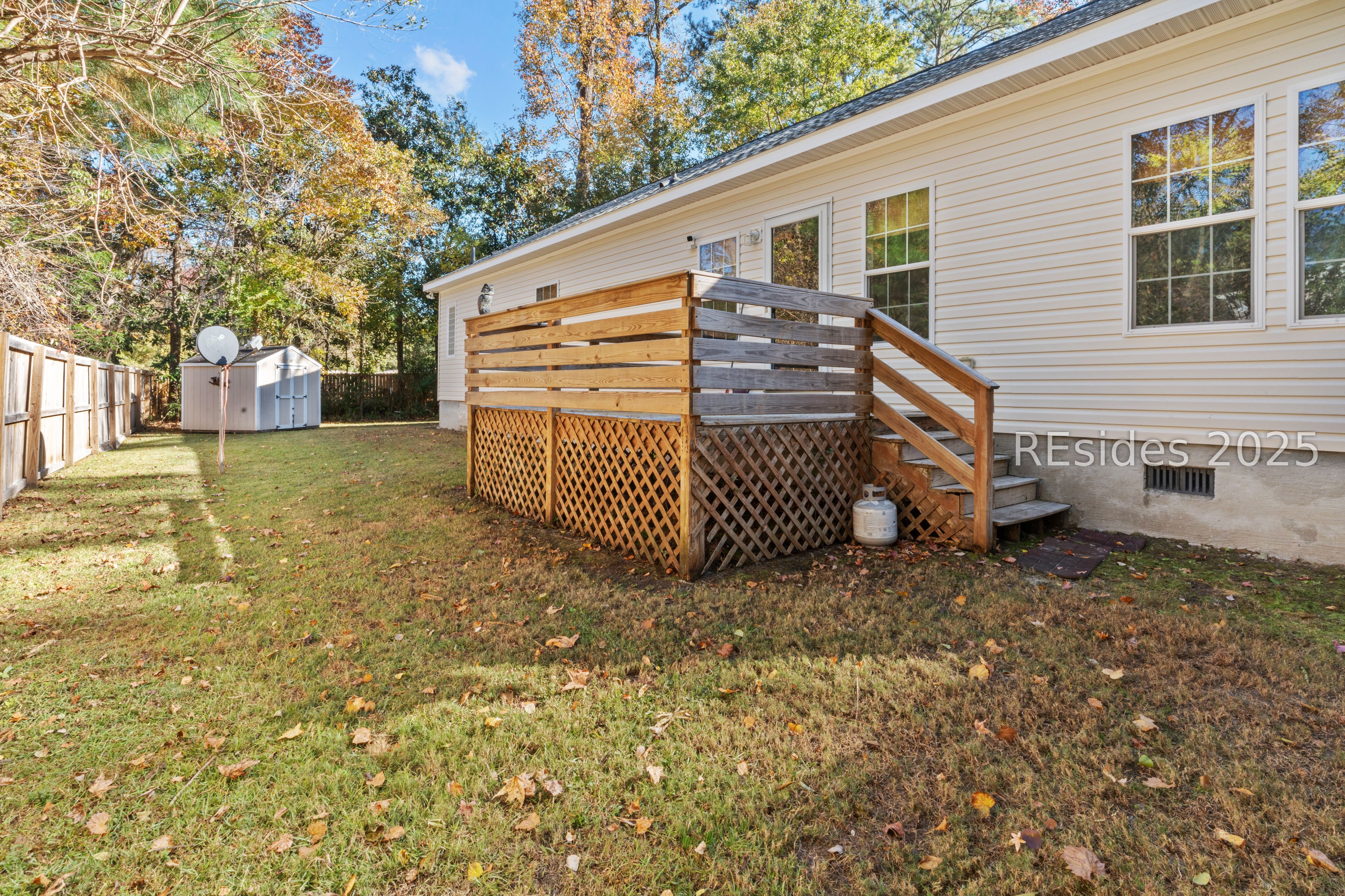 266 Wise Street Ridgeland, SC 29936 - Photo 7 of 35 Fenced back yard with elevated deck