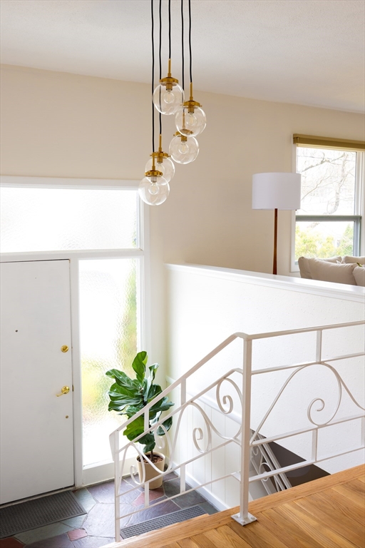 535 Clinton Road Brookline, MA 02467 - Photo 2 of 12 a view of entryway with wooden floor