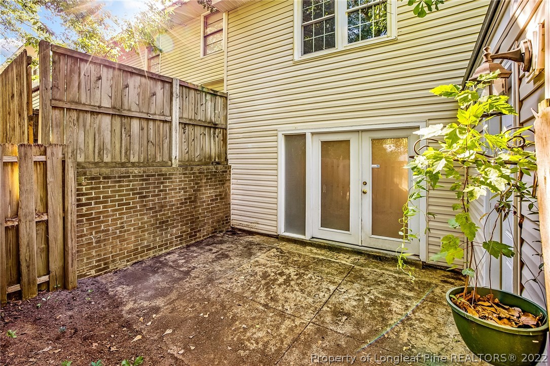 595 Winding Creek Road, Unit B Fayetteville, NC 28305 - Photo 15 of 17 a view of a small house with backyard