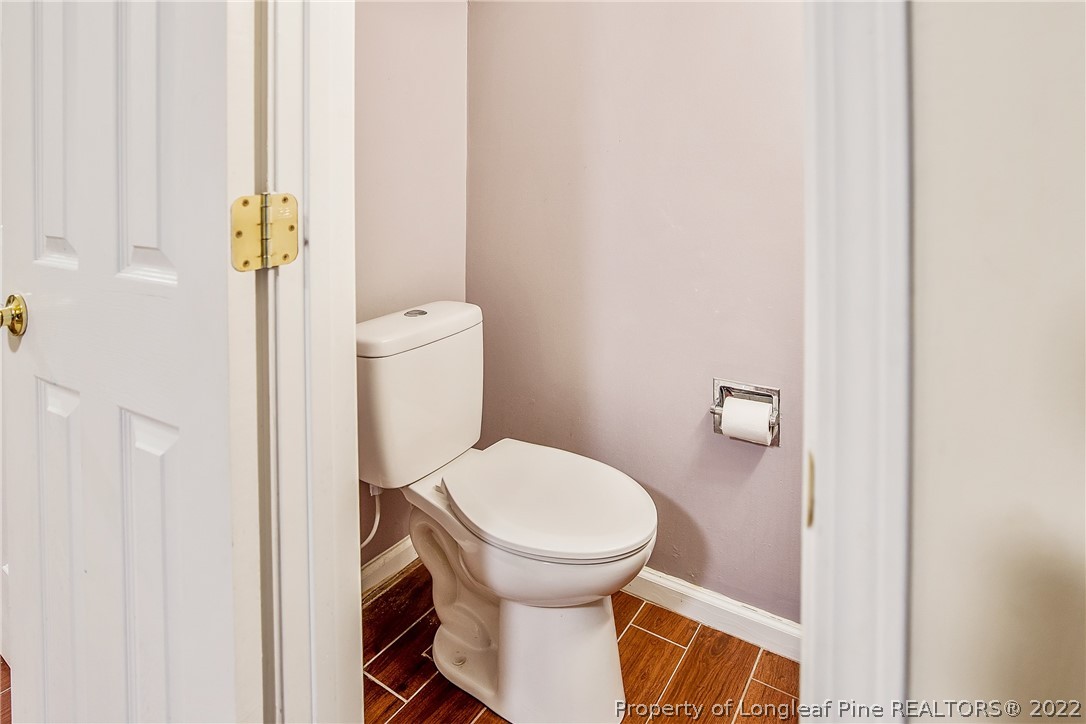 595 Winding Creek Road, Unit B Fayetteville, NC 28305 - Photo 7 of 17 a bathroom with a toilet and a shower