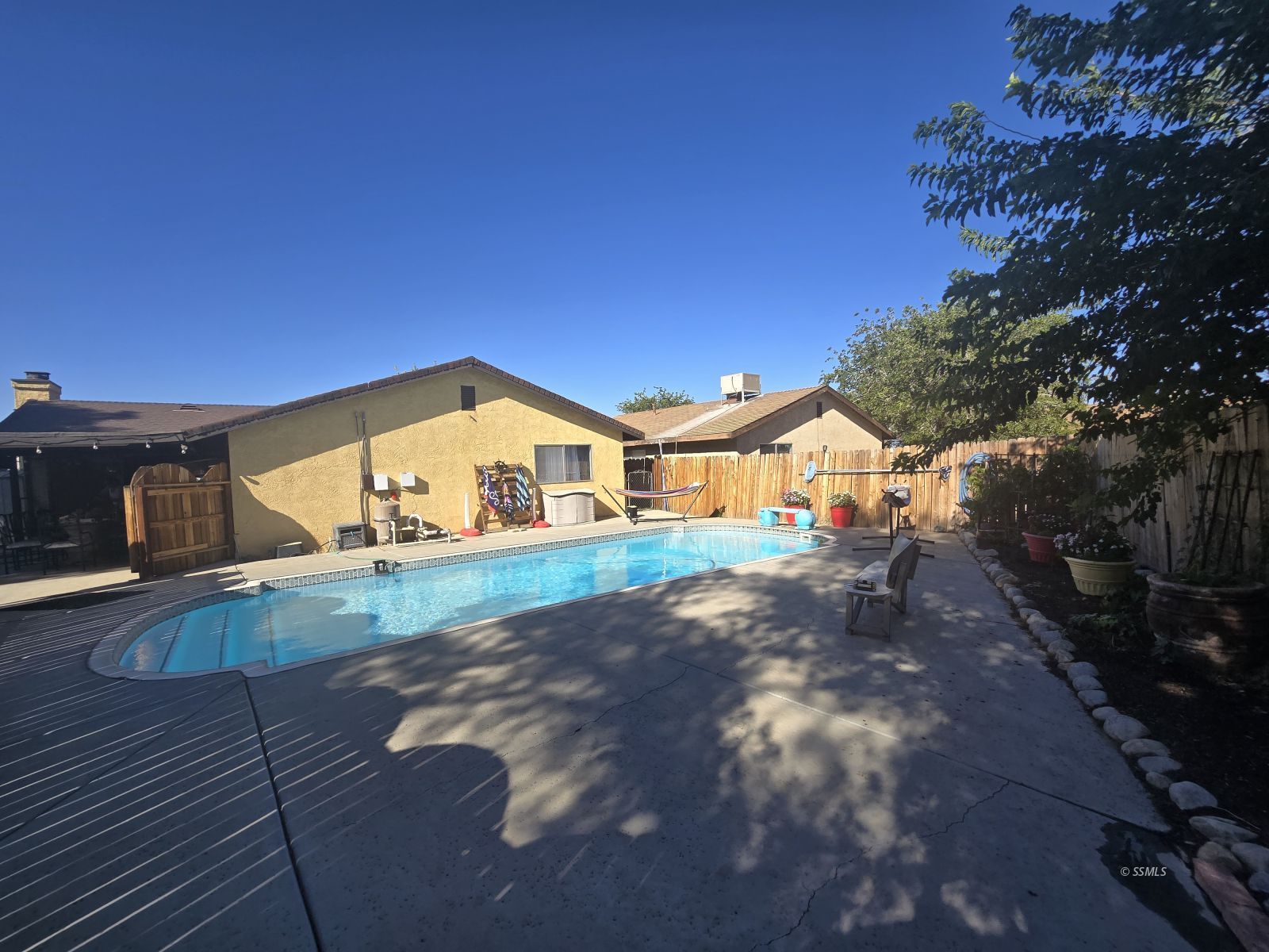 201 East Benson Avenue Ridgecrest, CA 93555 - Photo 28 of 35 a view of a house with a yard