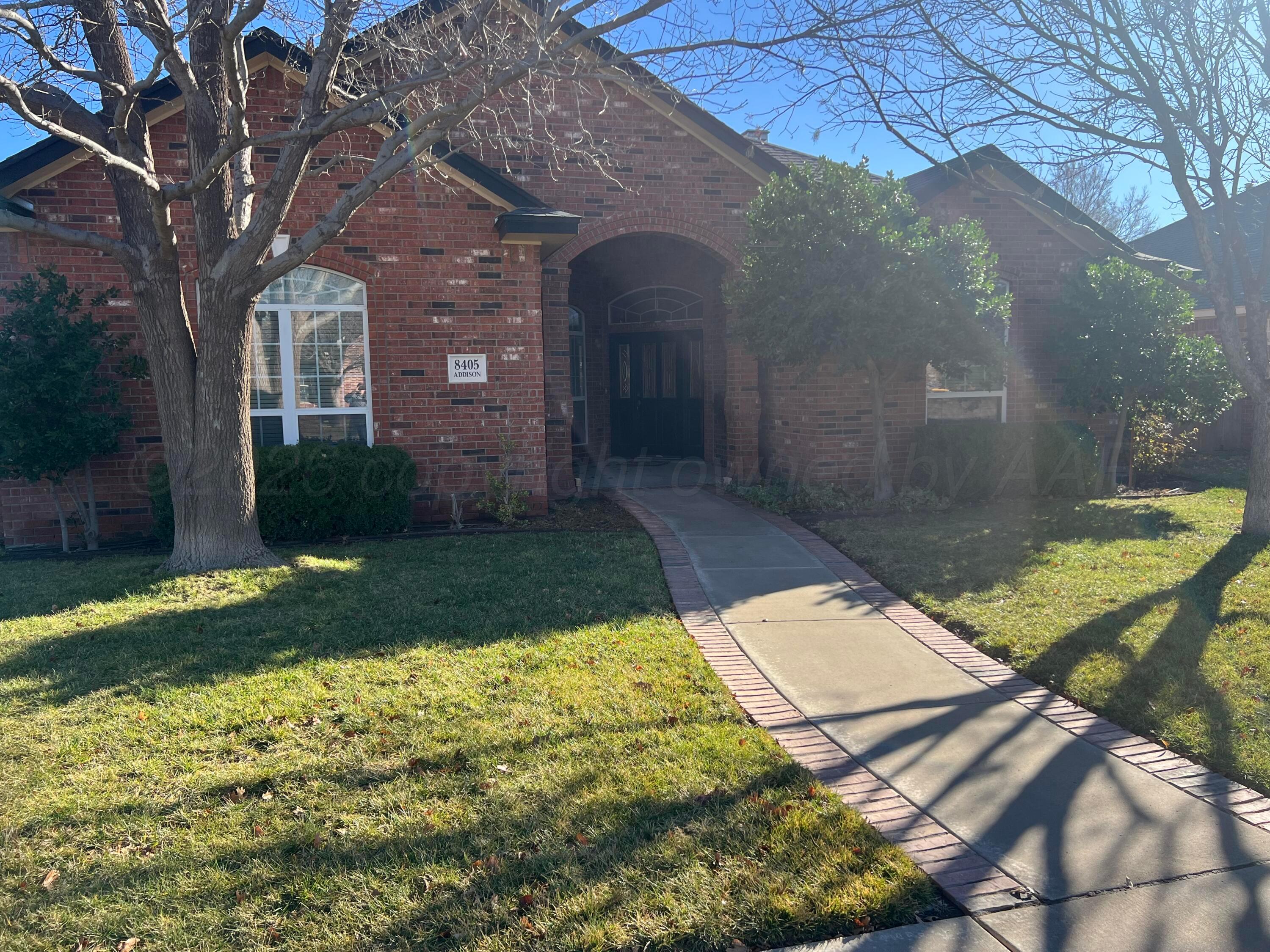 8405 Addison Drive Amarillo, TX 79119 - Photo 1 of 18 a backyard of a house with lots of green space