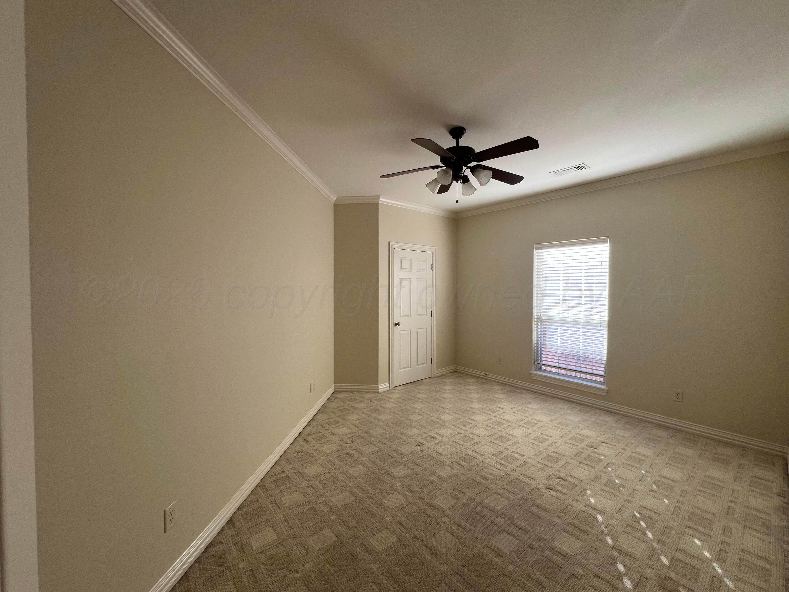 8405 Addison Drive Amarillo, TX 79119 - Photo 16 of 18 a view of empty room with ceiling fan