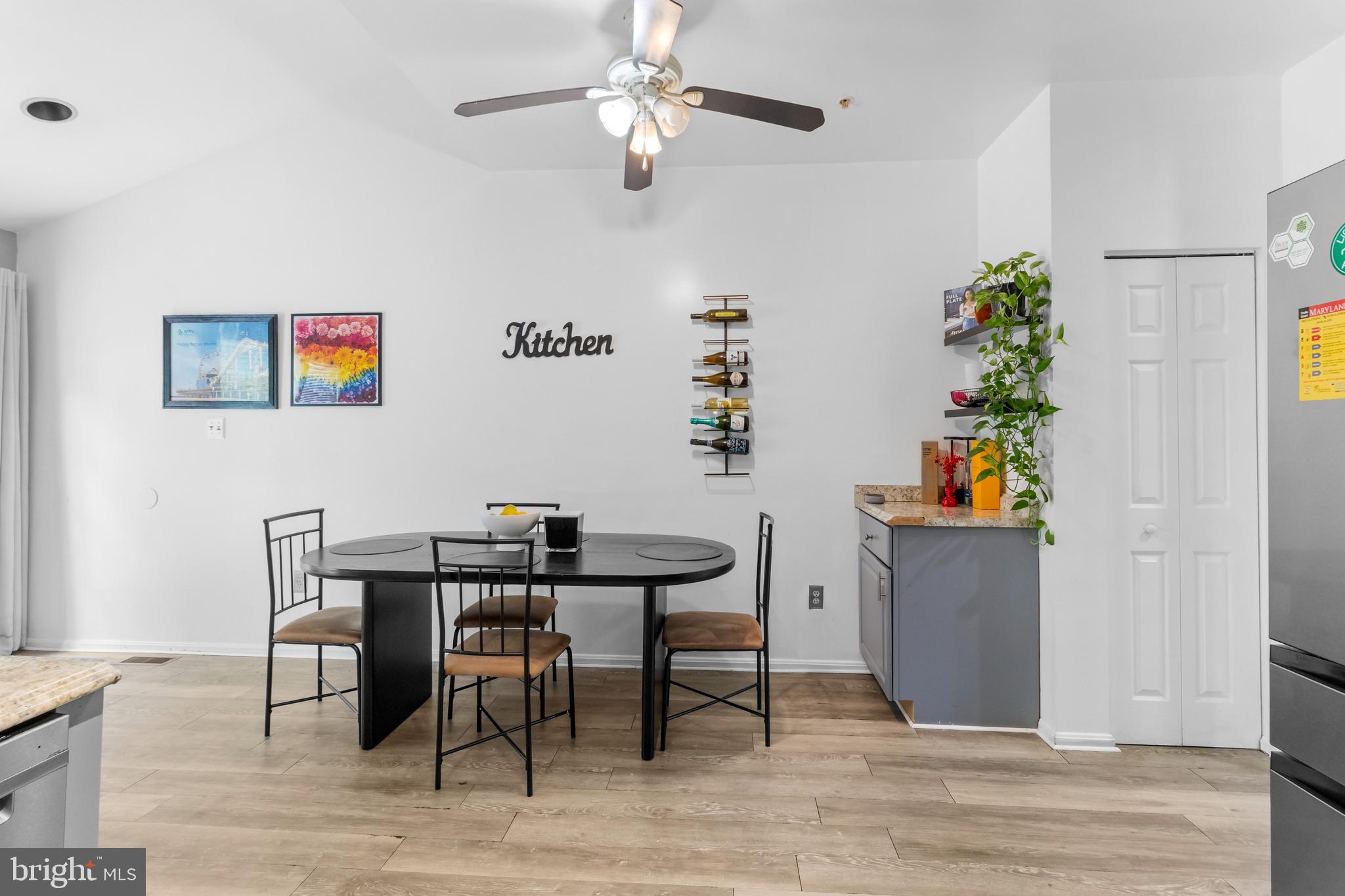 13 Bank Spring Court Owings Mills, MD 21117 - Photo 18 of 50 a view of a workspace with furniture and wooden floor