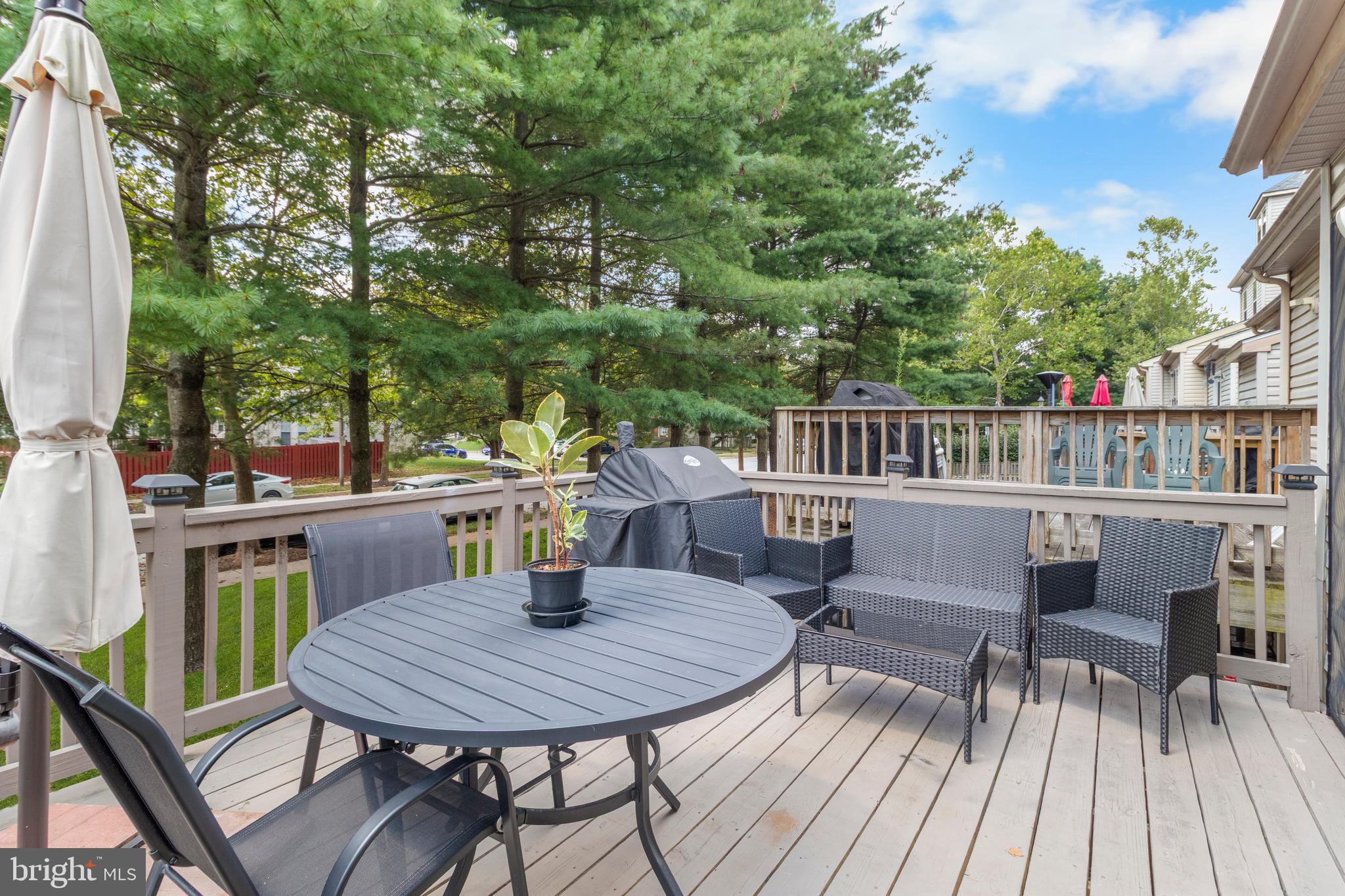 13 Bank Spring Court Owings Mills, MD 21117 - Photo 21 of 50 a view of a chairs and table on the deck