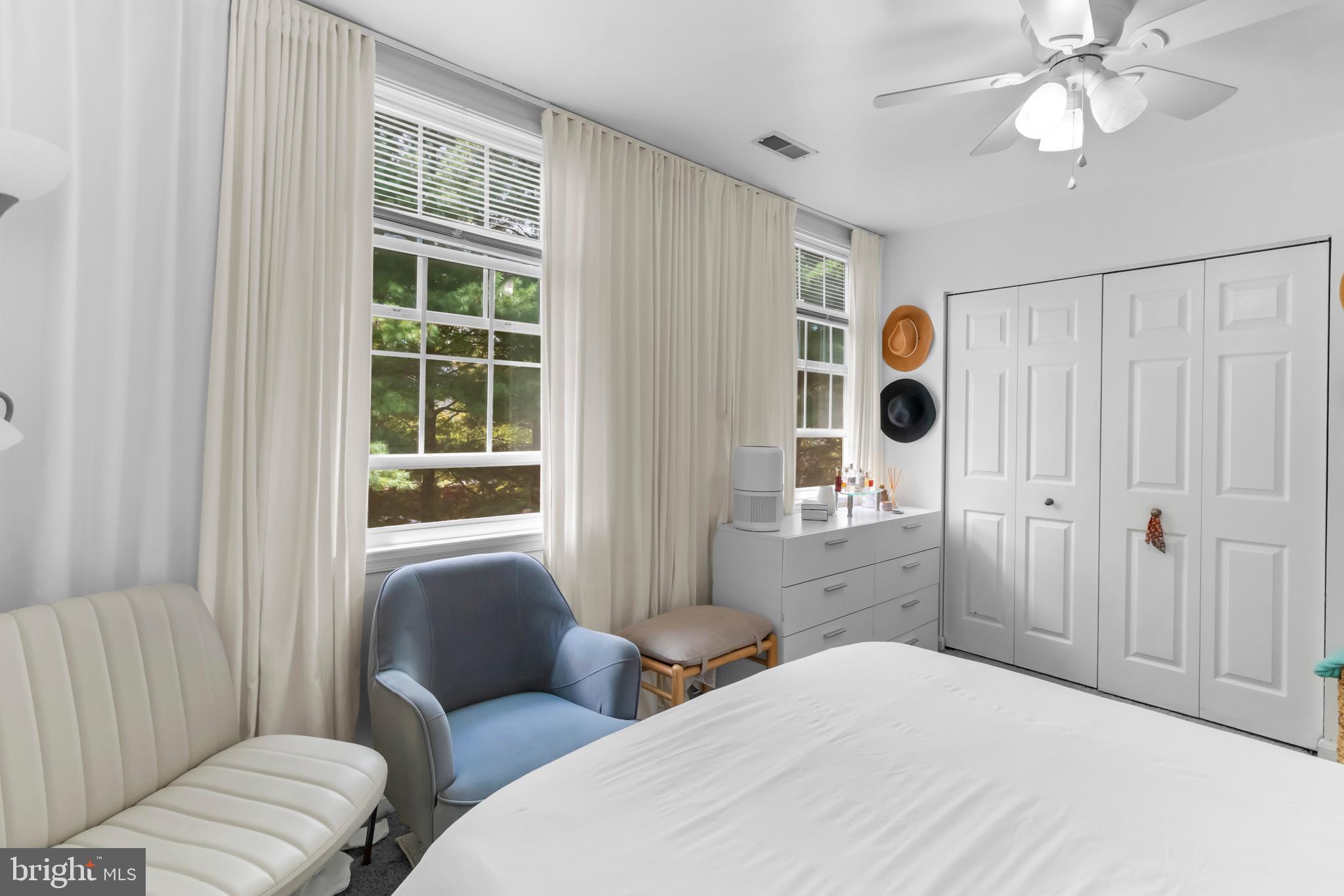 13 Bank Spring Court Owings Mills, MD 21117 - Photo 24 of 50 a bedroom with a bed and wooden floor