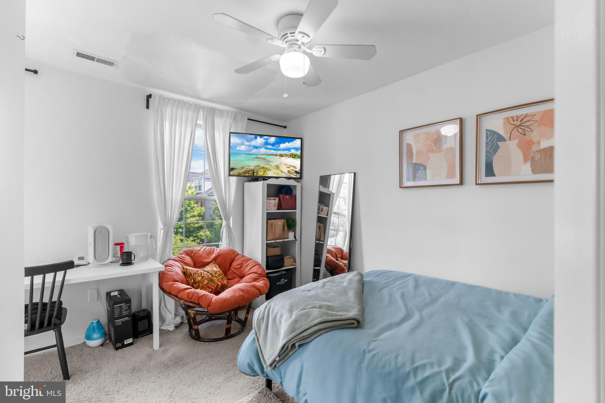 13 Bank Spring Court Owings Mills, MD 21117 - Photo 26 of 50 a bedroom with furniture and a large window