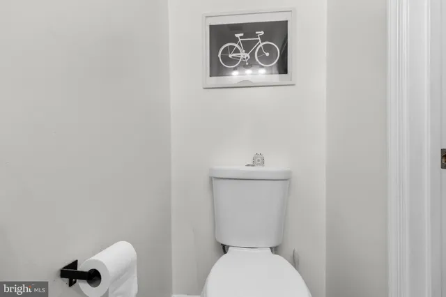 a bathroom with a toilet and a sink