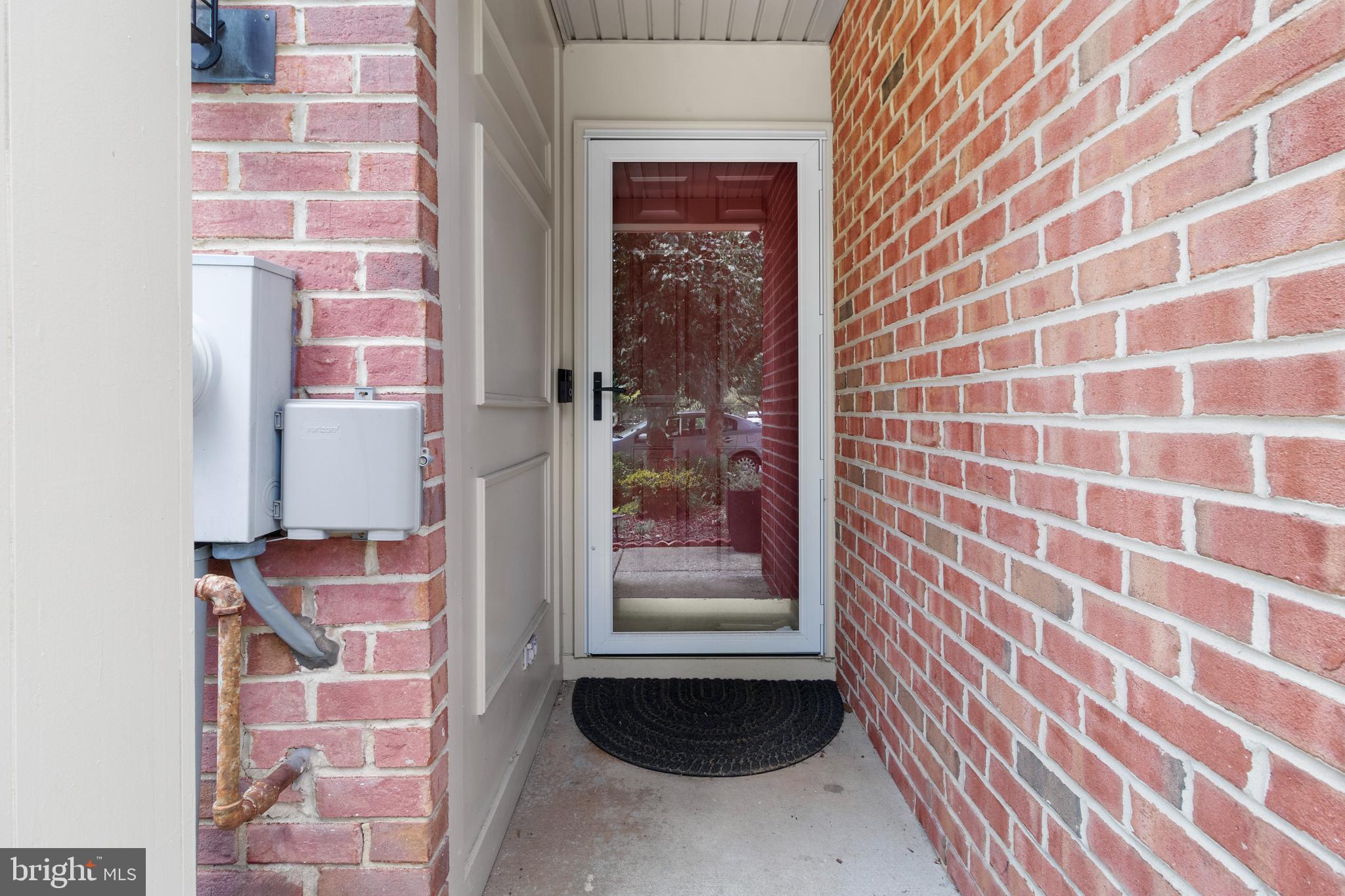13 Bank Spring Court Owings Mills, MD 21117 - Photo 4 of 50 a view of a brick wall
