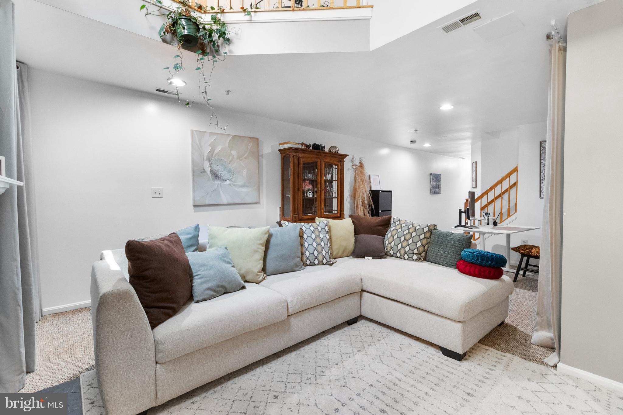 13 Bank Spring Court Owings Mills, MD 21117 - Photo 6 of 50 a living room with furniture and wooden floor