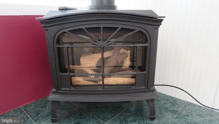 4106 Perry View Road Baltimore, MD 21236 - Photo 21 of 34 Gas stove fireplace
