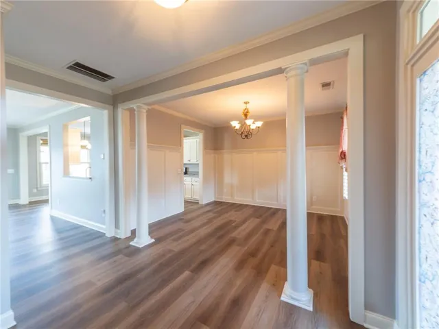 a bathroom with a glass door shower and a mirror