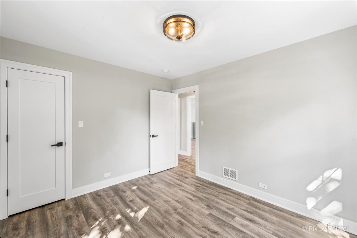 229 West Harding Road Lombard, IL 60148 - Photo 16 of 29 a view of an empty room and window